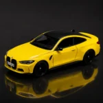 Yellow BMW M4 toy with packaging
